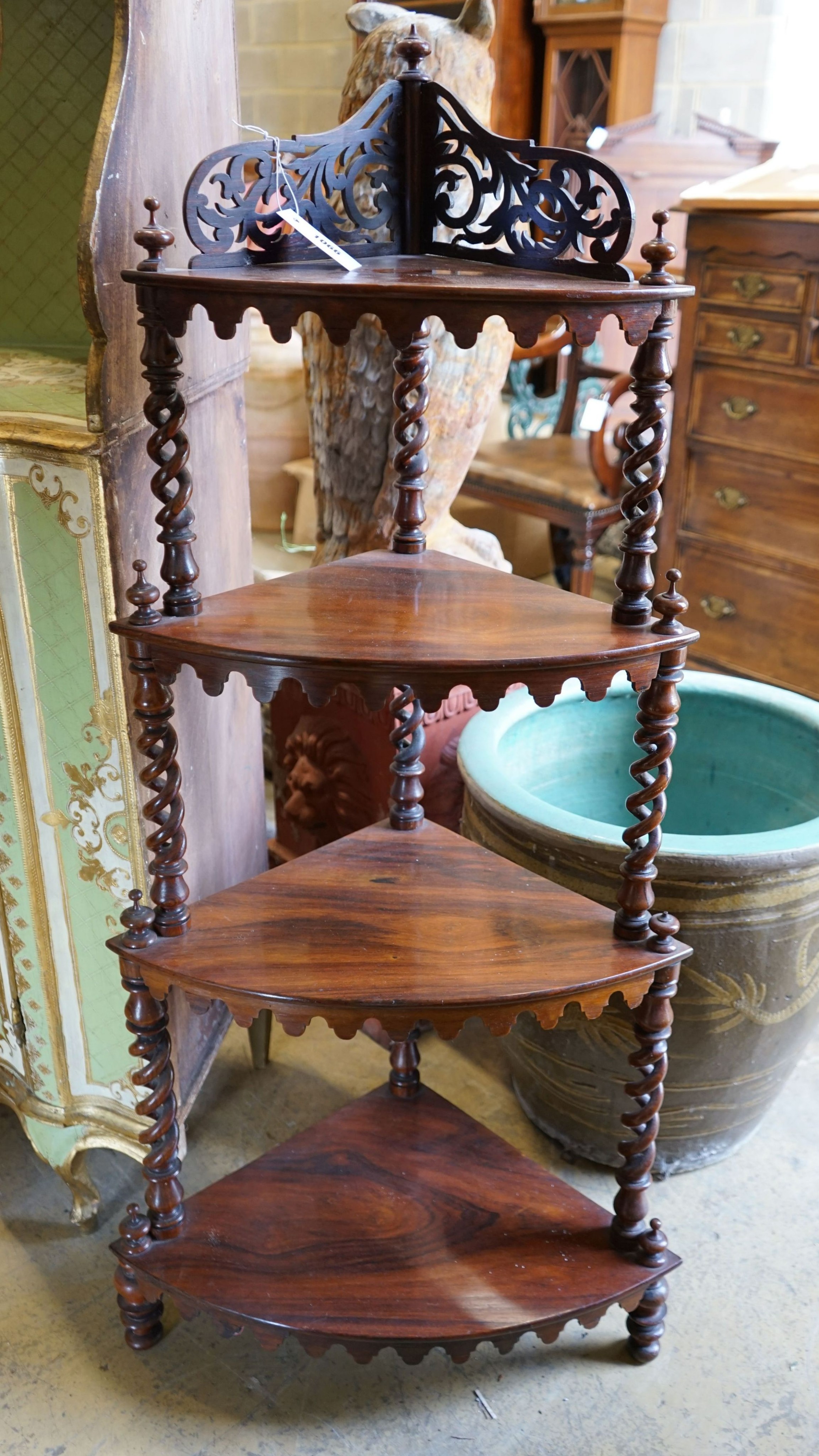 A Victorian rosewood bow front four tier corner whatnot, width 58cm, depth 36cm, height 122cm